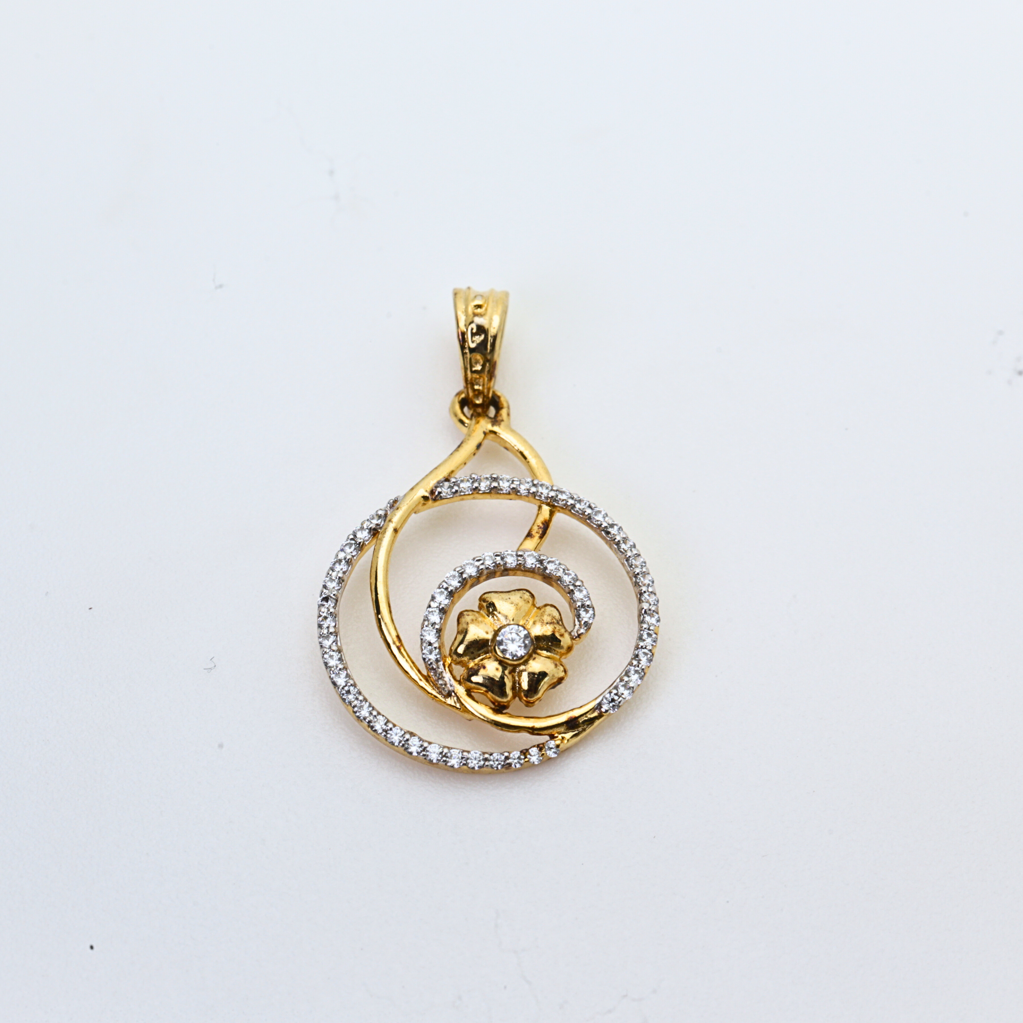 Gold Stone pendant In Floral Loop