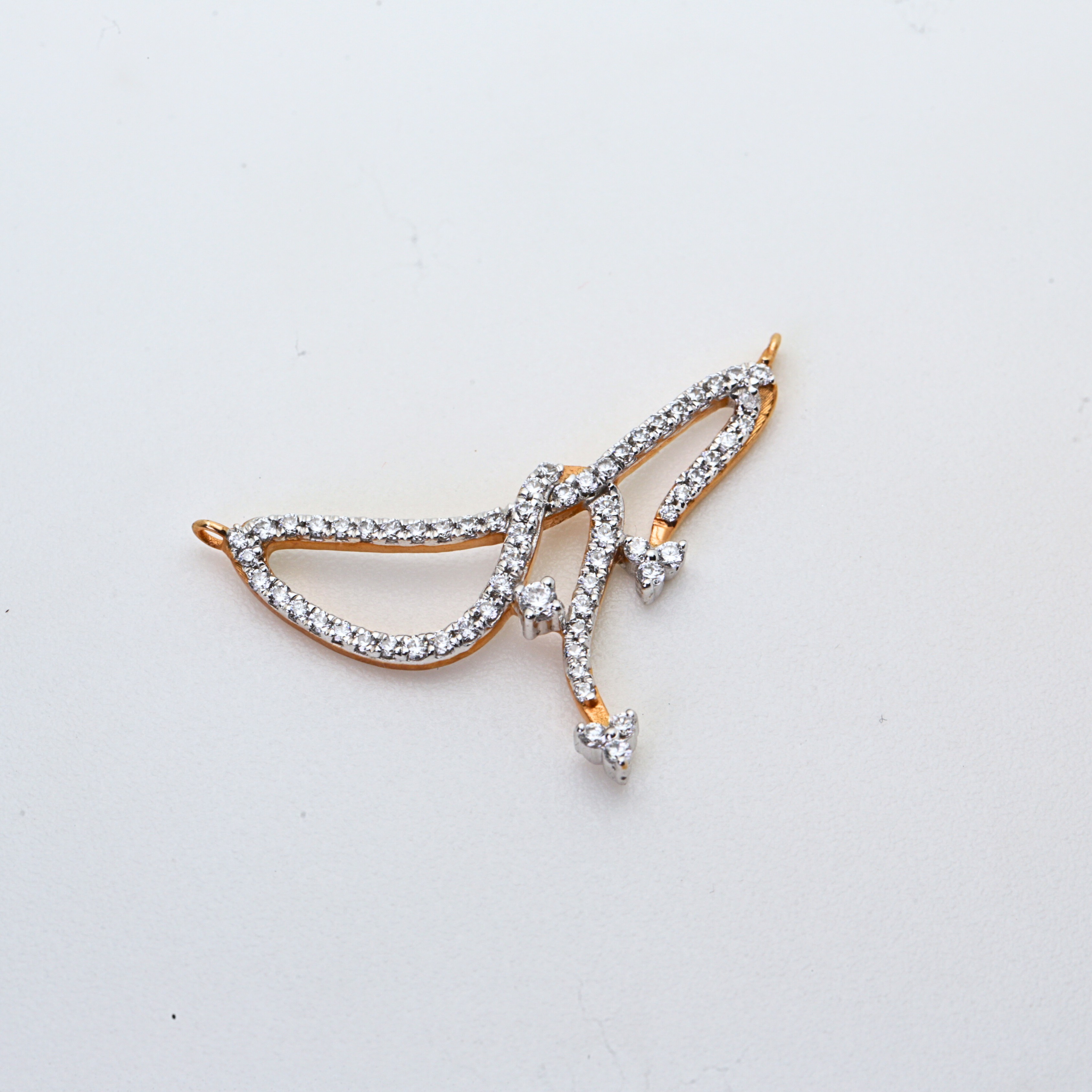 Abstract Wing Shape Gold Pendant With Stone Work