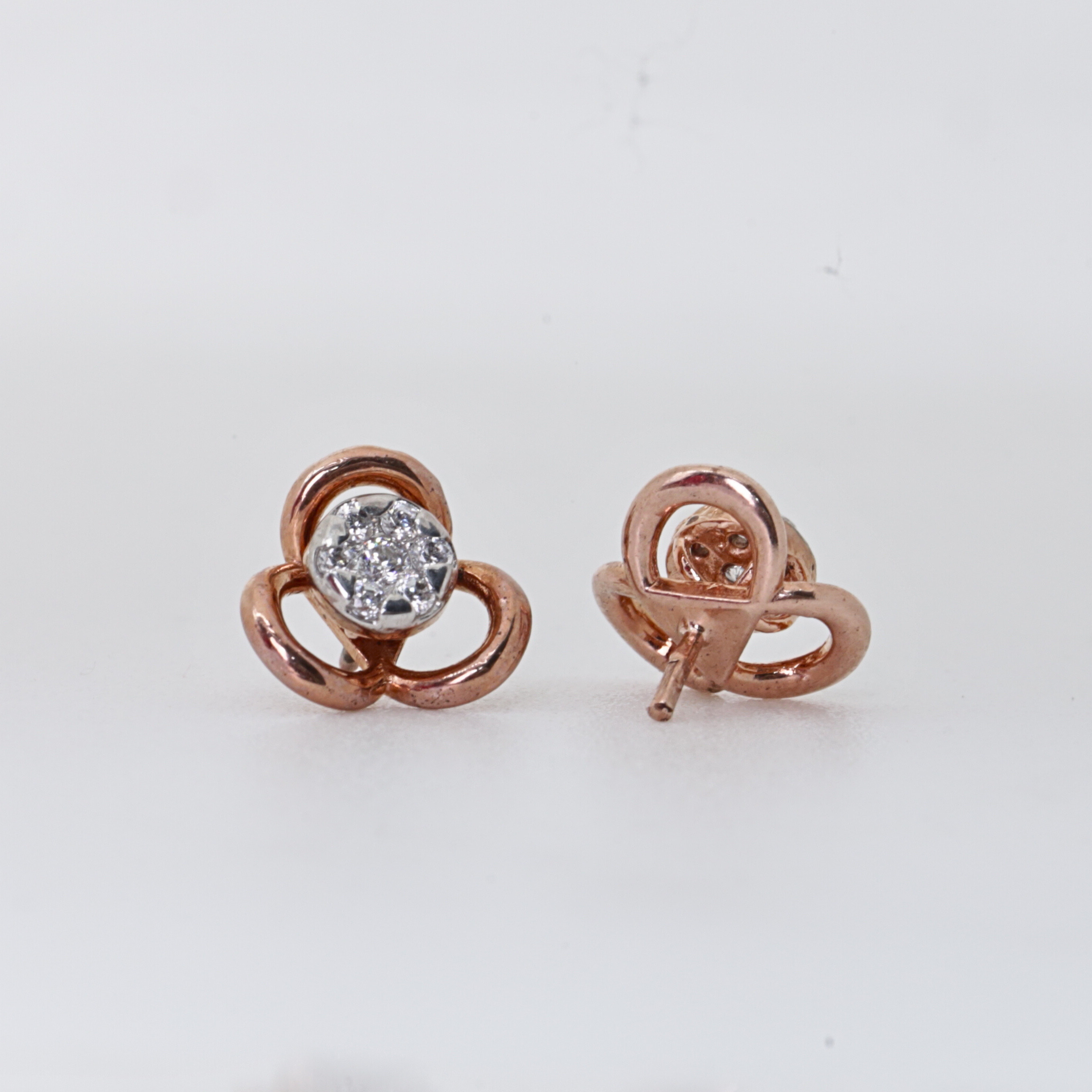 Three Petal Flower Shape Gold Stud Earrings With Round Stone
