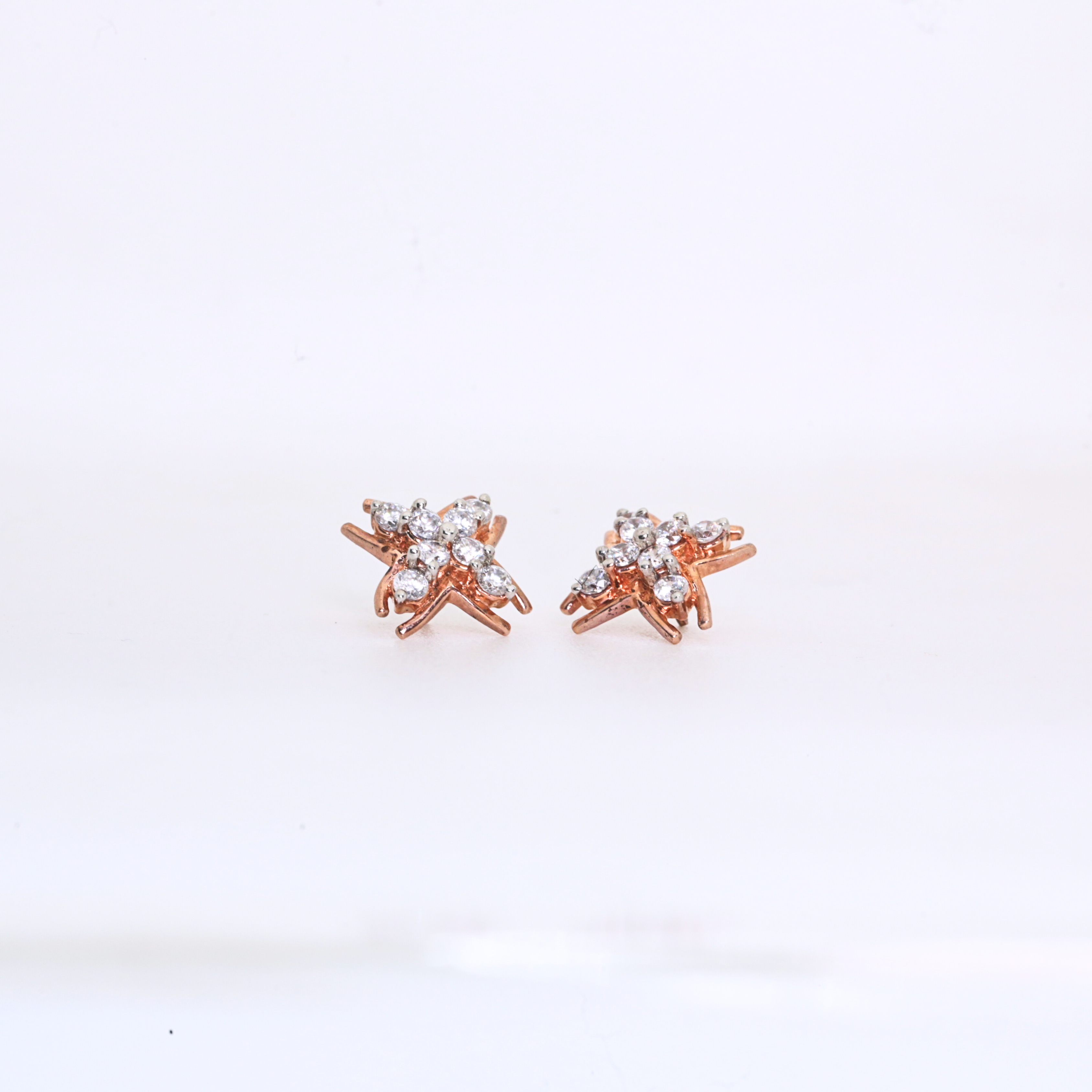 Petal Style Gold Studs With Round-Cut Diamonds