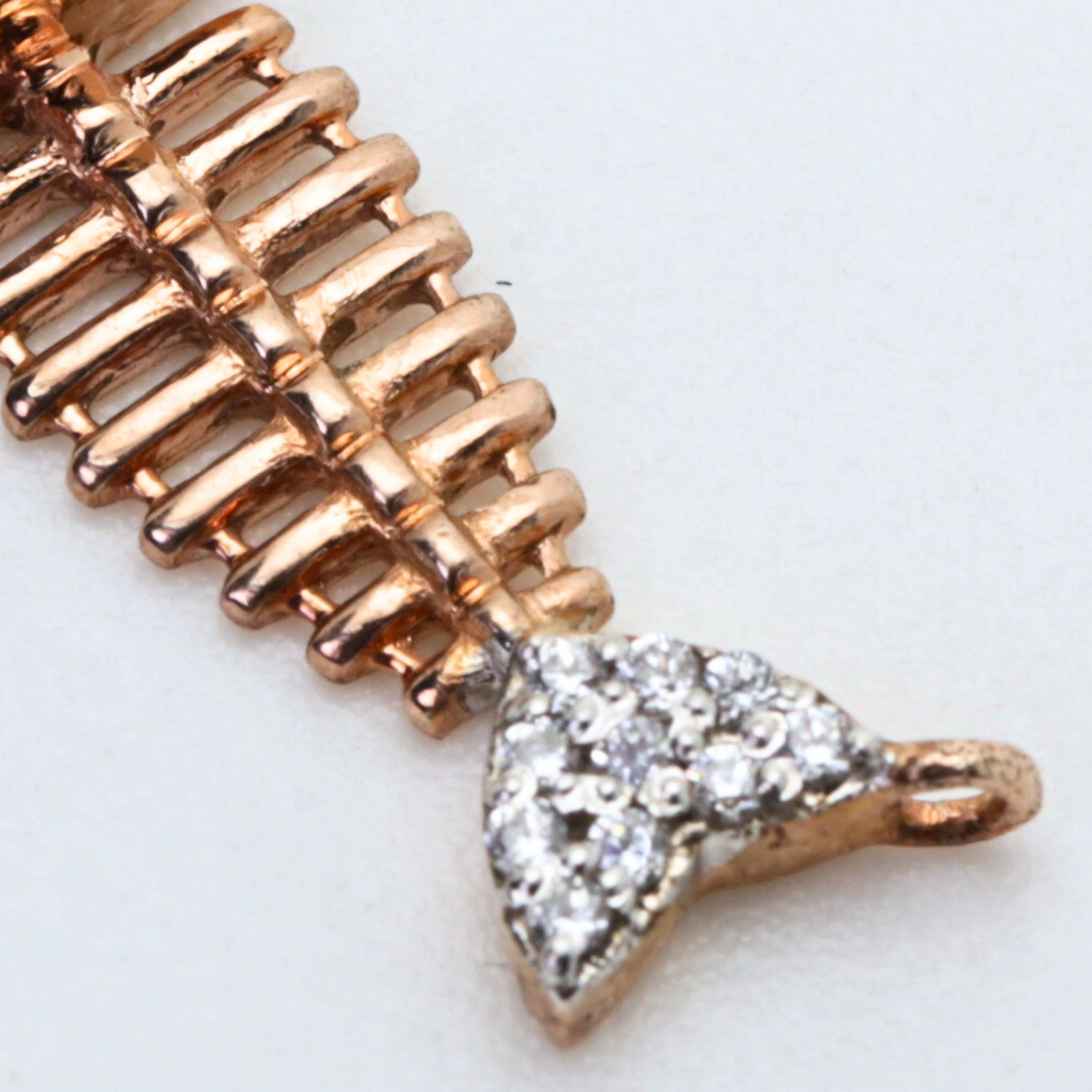 Fish Bone Shape Gold Pendant with Stone Studded Detailing