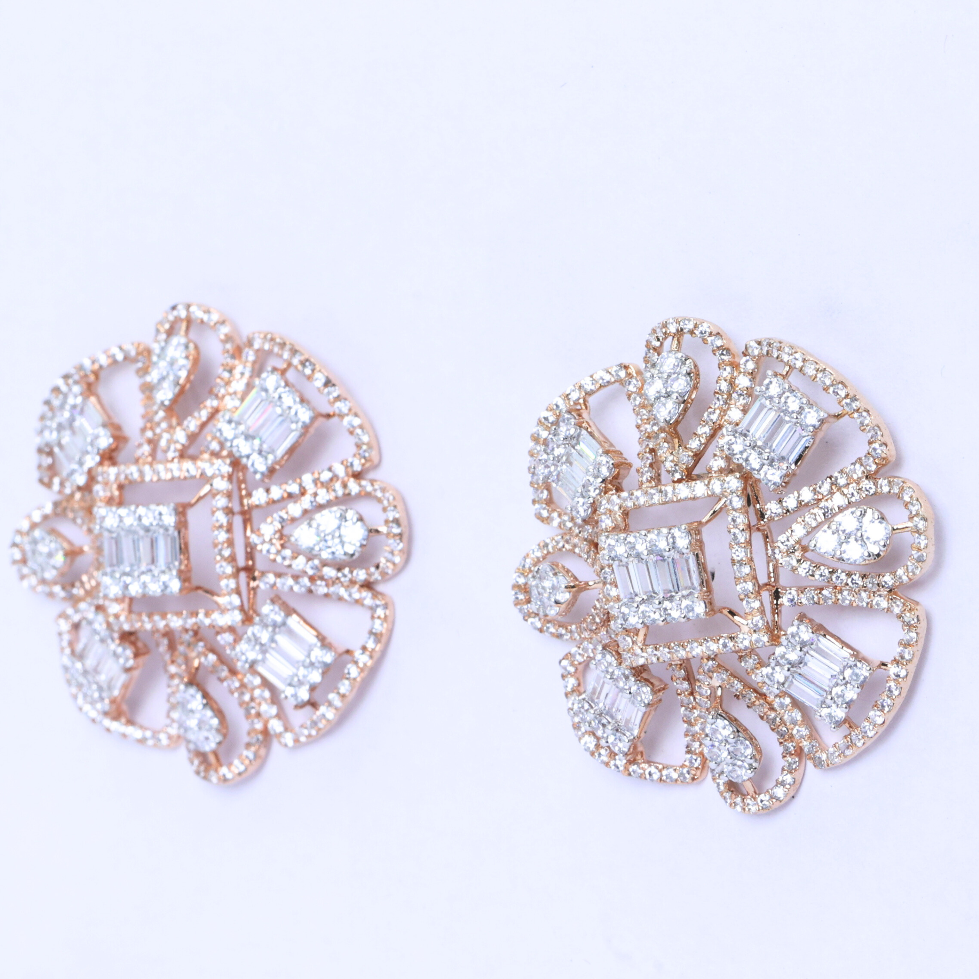 Baguette cut floral studs
Soft floral diamond studs
Classic floral studs
Floral baguette earrings
Radiant floral diamond studs
Floral motif diamond studs
Petal inspired diamond studs
Bloom inspired diamond studs
Floral cluster diamond studs
Baguette cluster floral studs