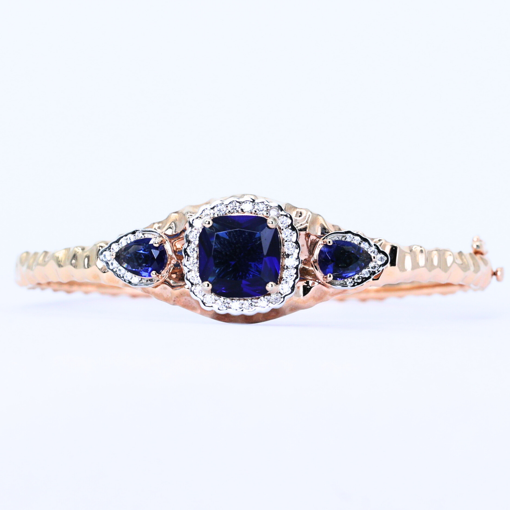 Blue gemstone bangle
Diamond blue bangle
Triple stone bracelet
Radiant blue bangle
Blue stone bangle
Triple diamond bangle
Blue diamond bracelet
Blue gemstone bangle
Blue diamond trio
Triple blue stone bracelet