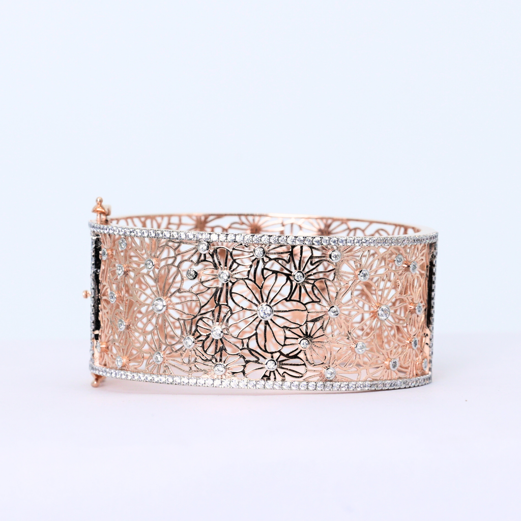 Floral Lace diamond cuff bangle
Diamond cuff bangle
Floral diamond bangle
Diamond bangle on gold
Elegant cuff bangle
Close up of diamond lace
Floral diamond centerpiece
Diamond bangle top view
Side view of cuff bangle
Minimalist diamond cuff