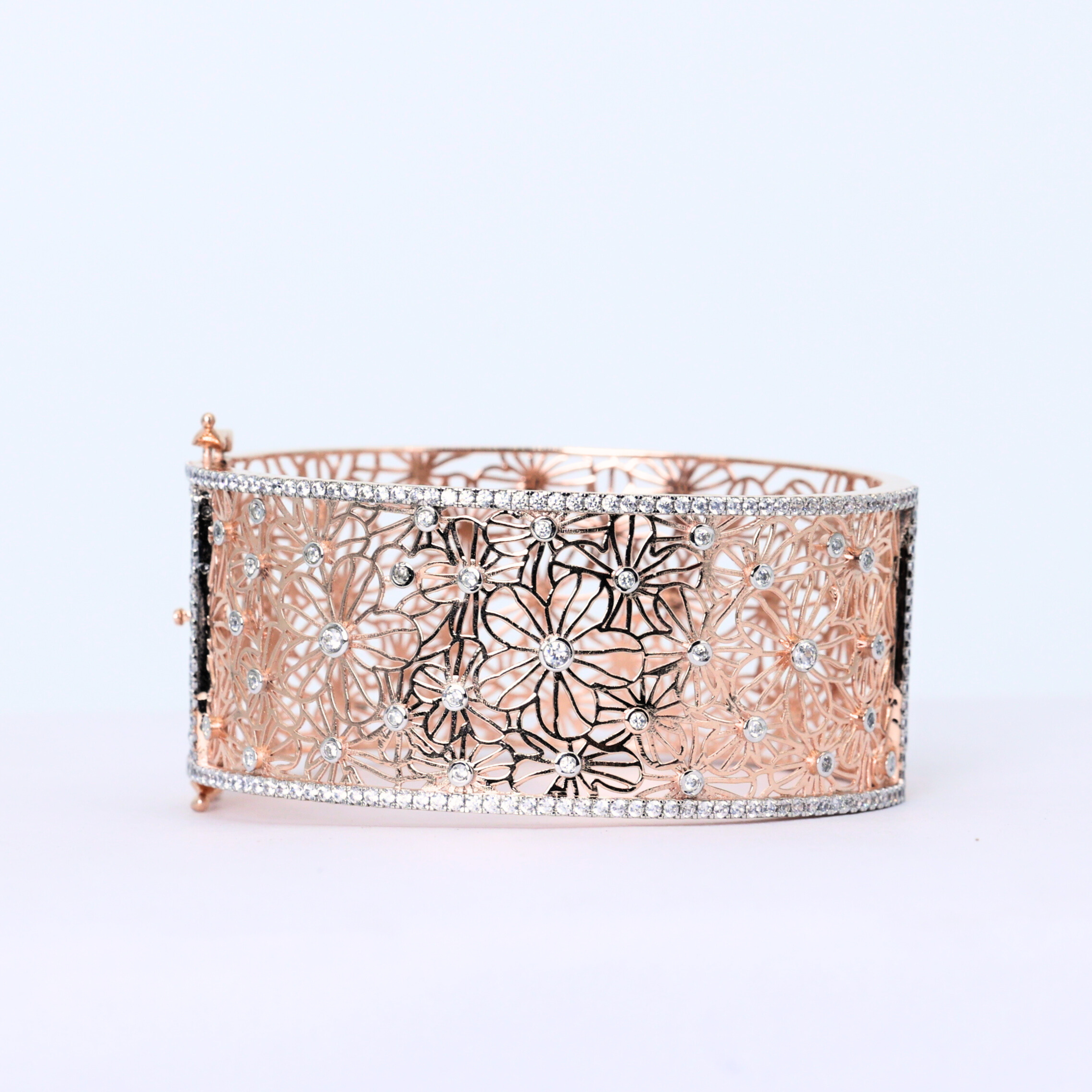 Floral Lace diamond cuff bangle
Diamond cuff bangle
Floral diamond bangle
Diamond bangle on gold
Elegant cuff bangle
Close up of diamond lace
Floral diamond centerpiece
Diamond bangle top view
Side view of cuff bangle
Minimalist diamond cuff
