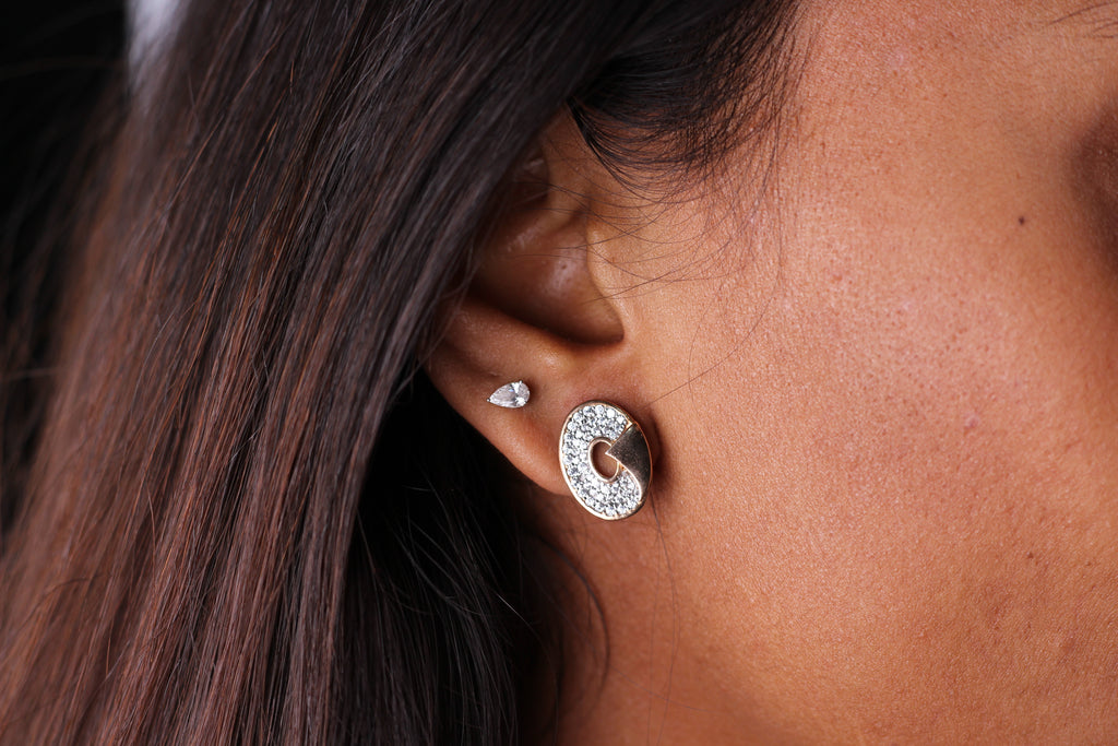 Oval Spiral Shape Gold Stud Earrings