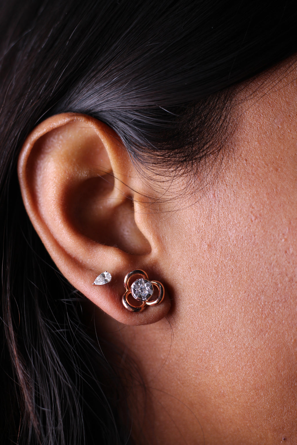 Three Petal Flower Shape Gold Stud Earrings With Round Stone