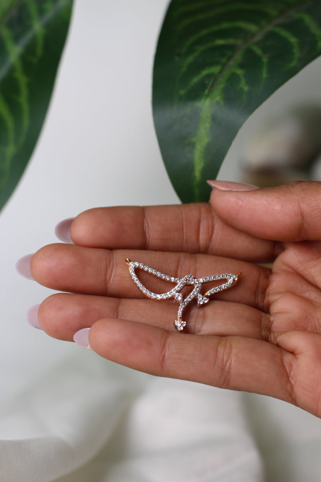 Abstract Wing Shape Gold Pendant With Stone Work