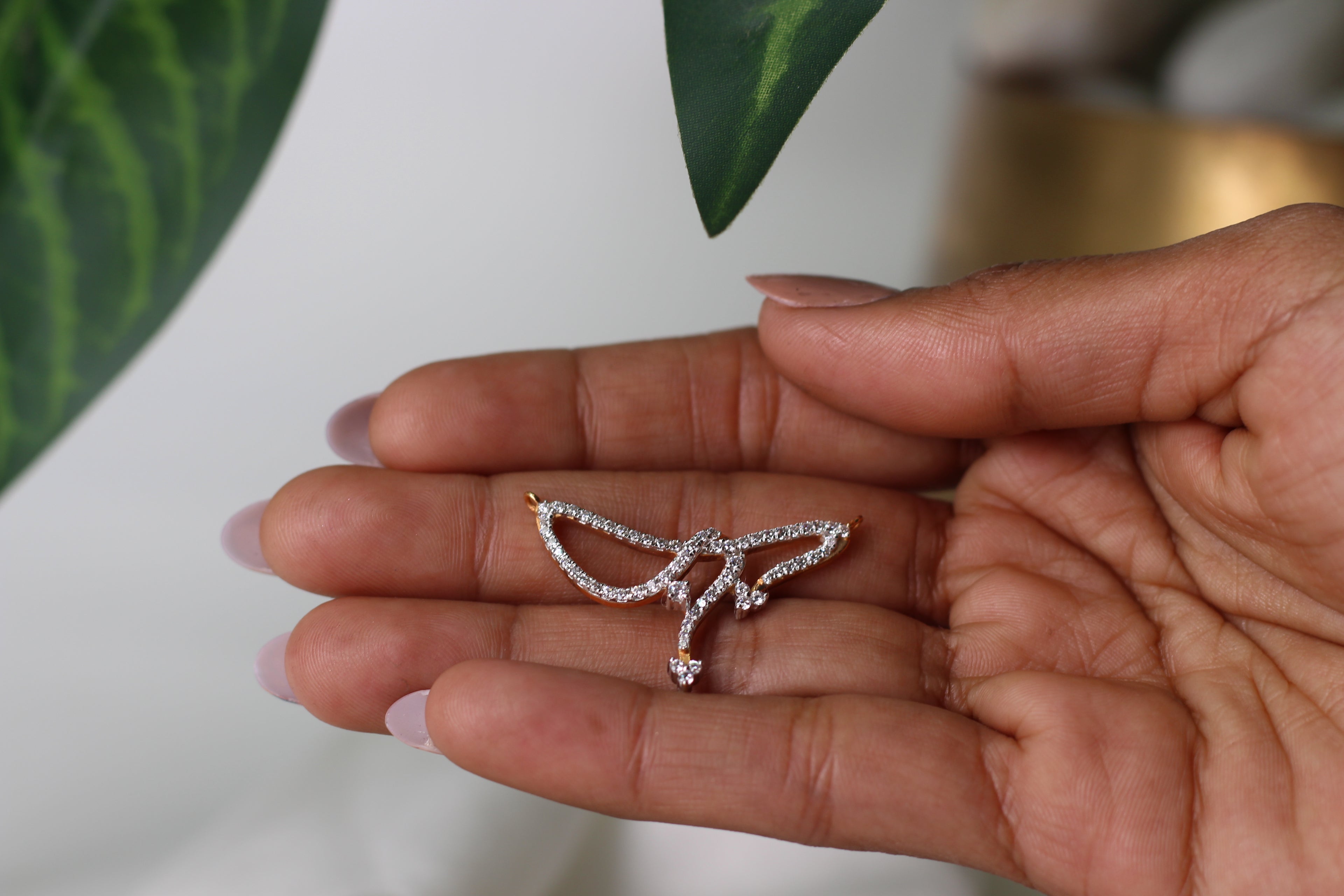 Abstract Wing Shape Gold Pendant With Stone Work