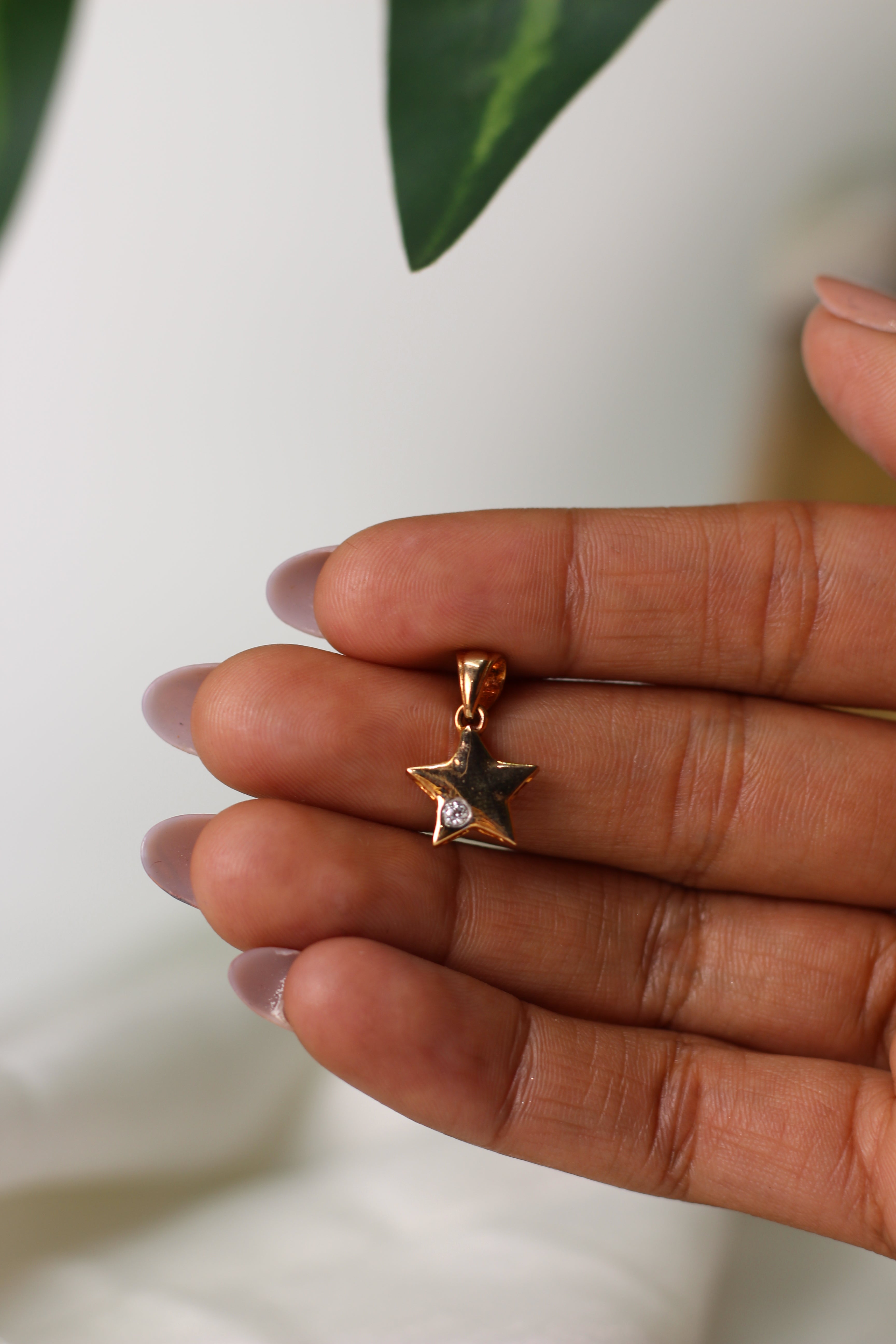 Star Shape Gold Pendant with Single Round Stone Accent