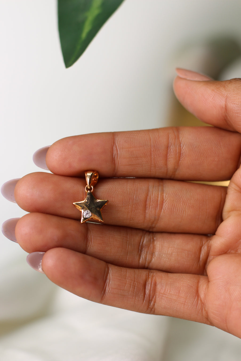 Star Shape Gold Pendant with Single Round Stone Accent