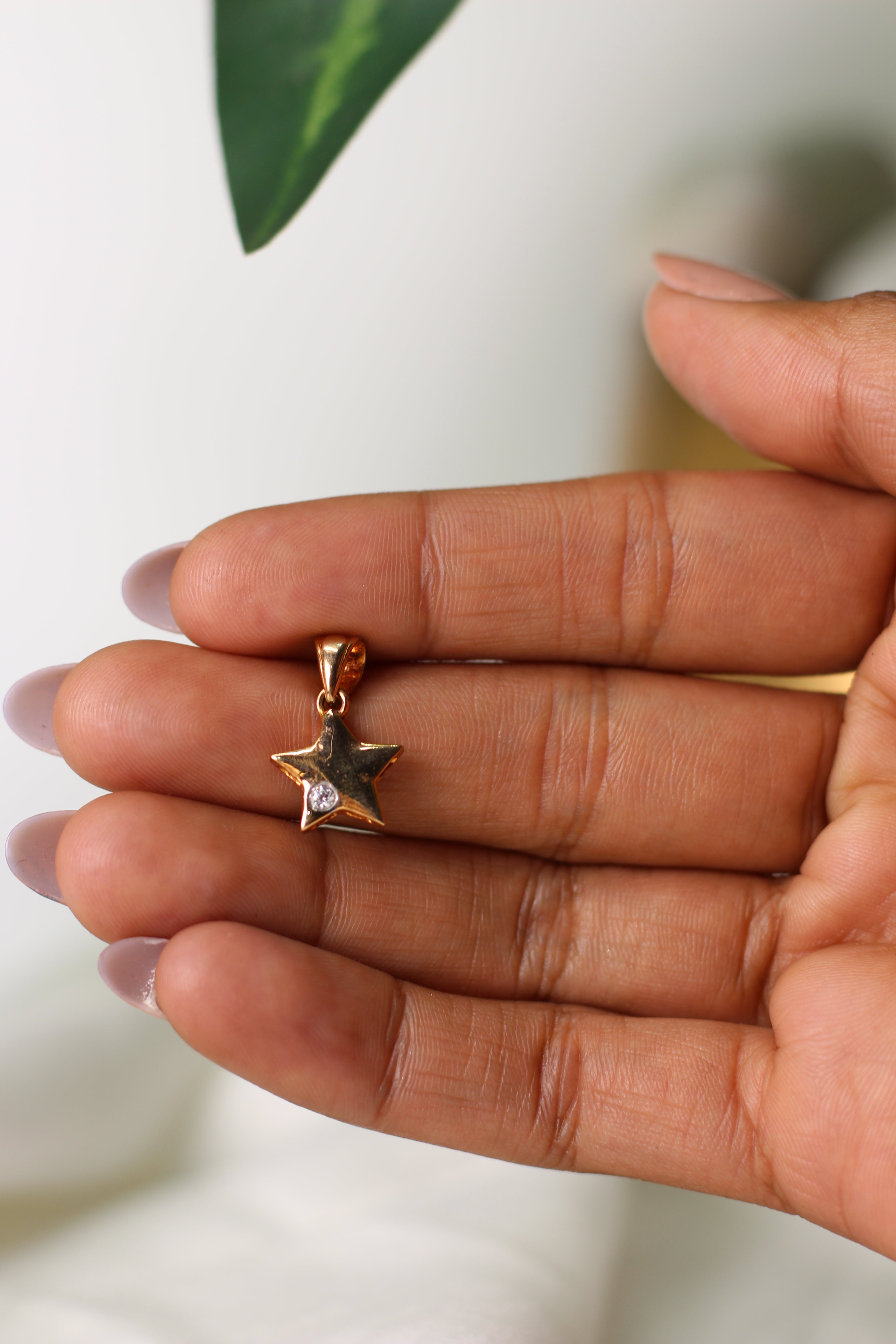 Star Shape Gold Pendant with Single Round Stone Accent