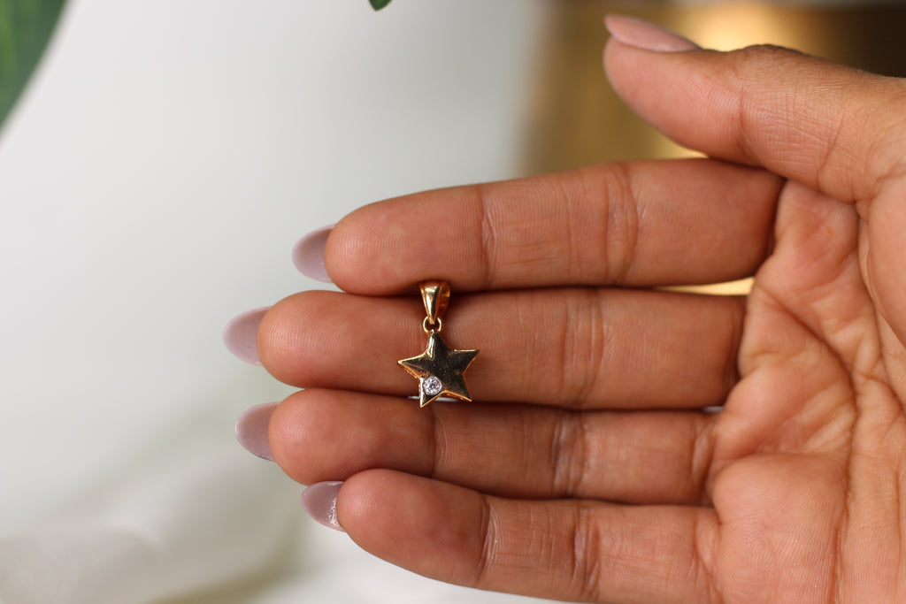 Star Shape Gold Pendant with Single Round Stone Accent