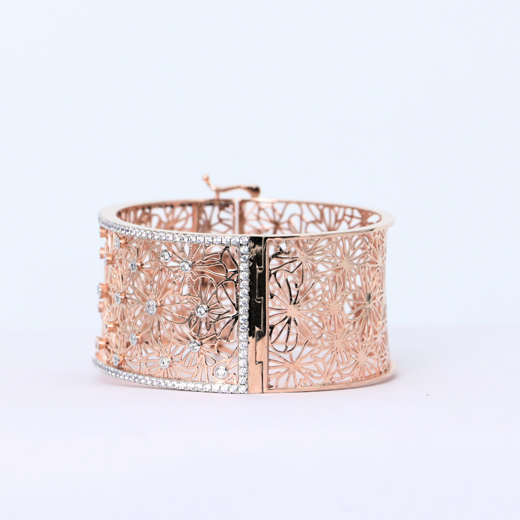 Diamond centerpiece cuff
Elegant diamond bangle
Diamond cuff with lace design
White gold floral lace cuff
Lab grown diamond bangle
Floral diamond display
Top view of lace bangle
Side profile of diamond cuff
Shimmering halo cuff bangle
Diamond bangle for engagement