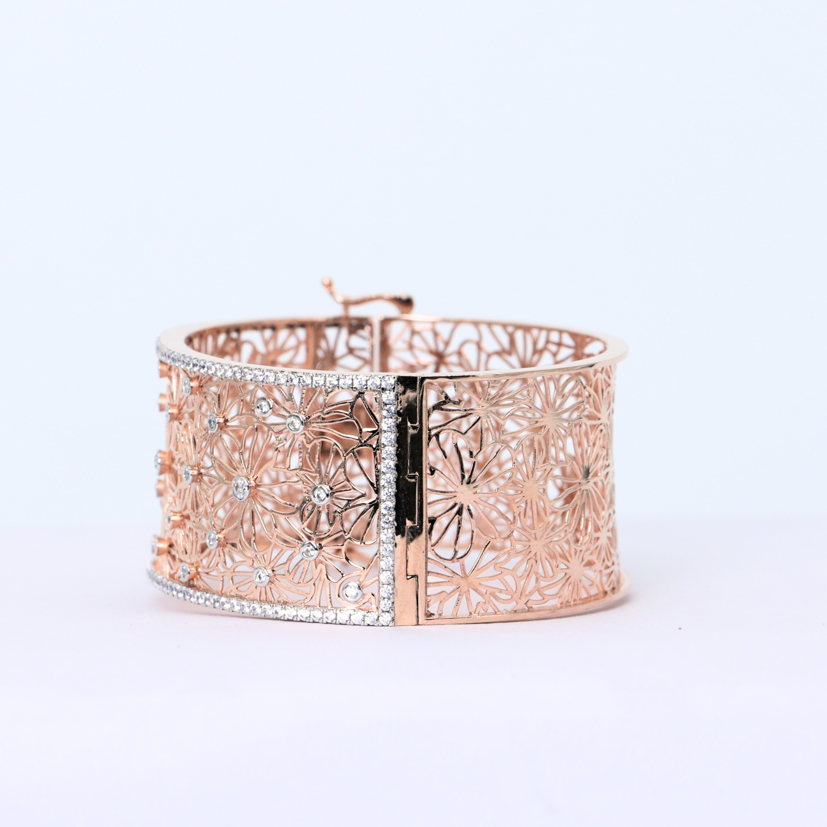 Diamond centerpiece cuff
Elegant diamond bangle
Diamond cuff with lace design
White gold floral lace cuff
Lab grown diamond bangle
Floral diamond display
Top view of lace bangle
Side profile of diamond cuff
Shimmering halo cuff bangle
Diamond bangle for engagement