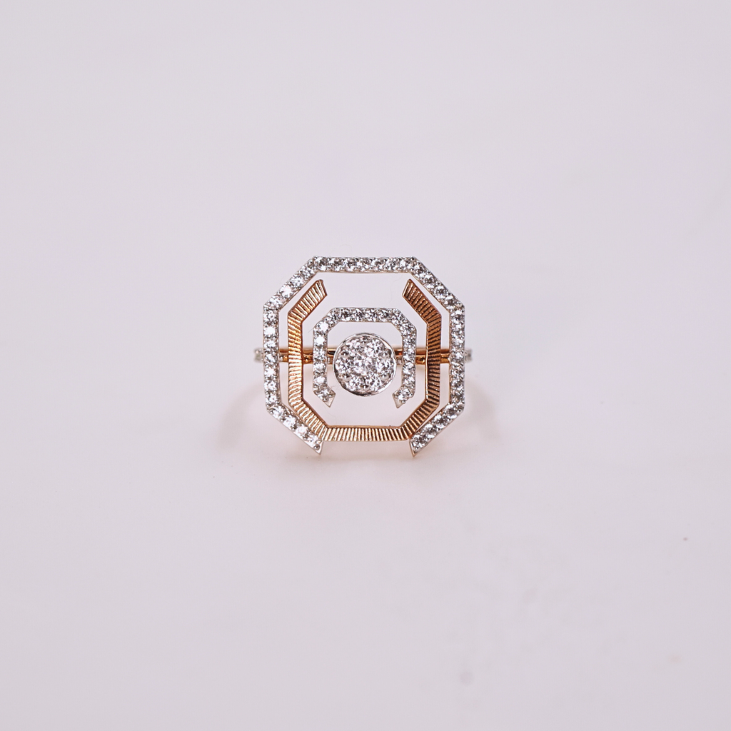 Radiant Orbit diamond ring
Square cut diamond ring
Halo diamond ring
Diamond on white gold band
Elegant engagement ring
Orbit inspired diamond band
Close up of diamond
Diamond ring top view
Side view of diamond ring
White gold diamond ring