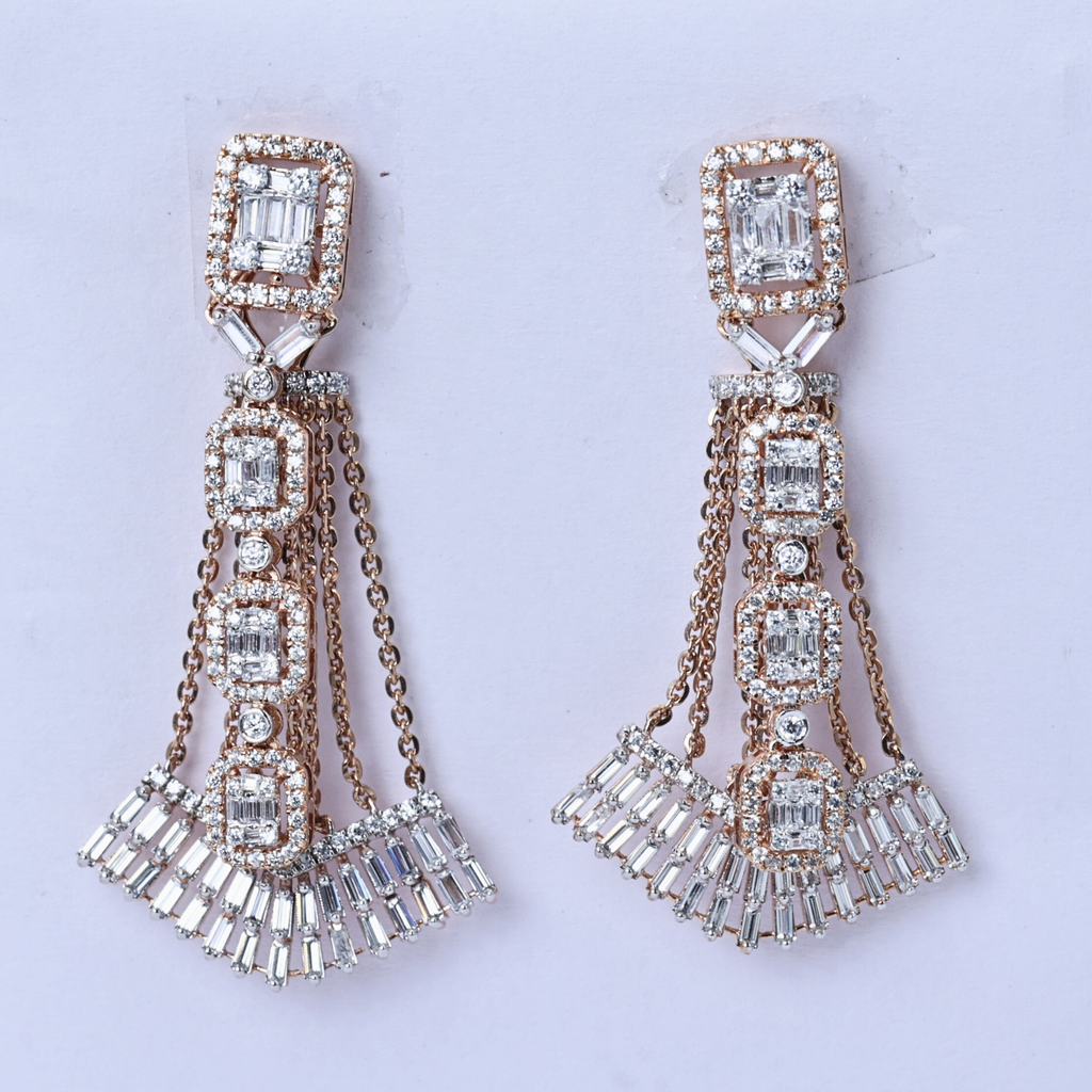 Pair of diamond earrings
White gold cascade studs
Fine diamond cascade earrings
Diamond studs under soft light
Minimalist diamond stud earrings
Diamond earrings for gifting
Cascade pattern diamond earrings
Delicate white gold diamond studs
Shiny cascade diamond studs
Shimmering pair of cascade earrings